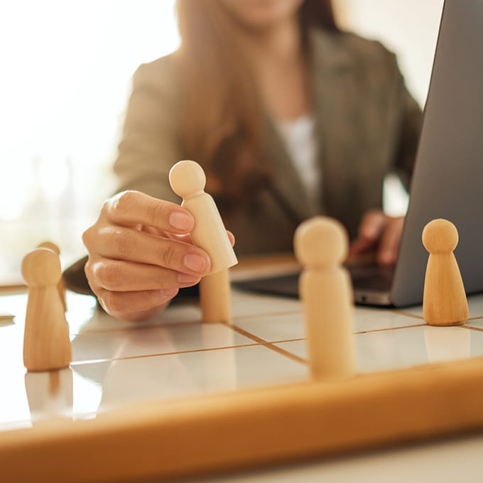 Small business owner reviewing financial data to plan strategic investments for growth.